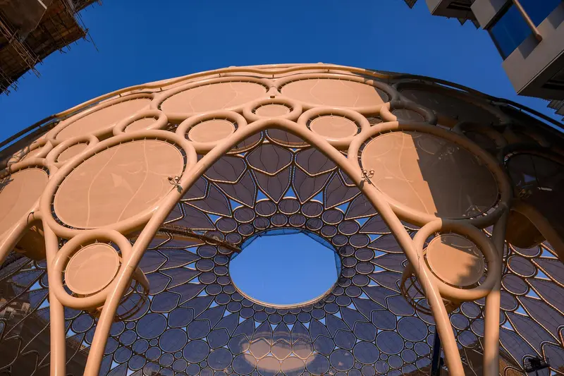 Looking up through the lattice dome of Al Wasl Plaza at Expo City Dubai